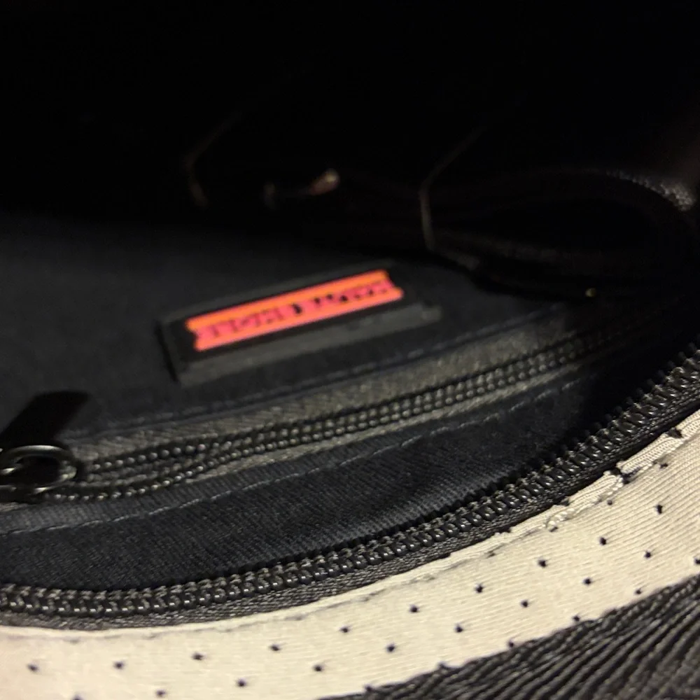 Haute shore brand.  Trendy Black and Gray Crossbody Bag with Pink Accents - Picture 4 of 8